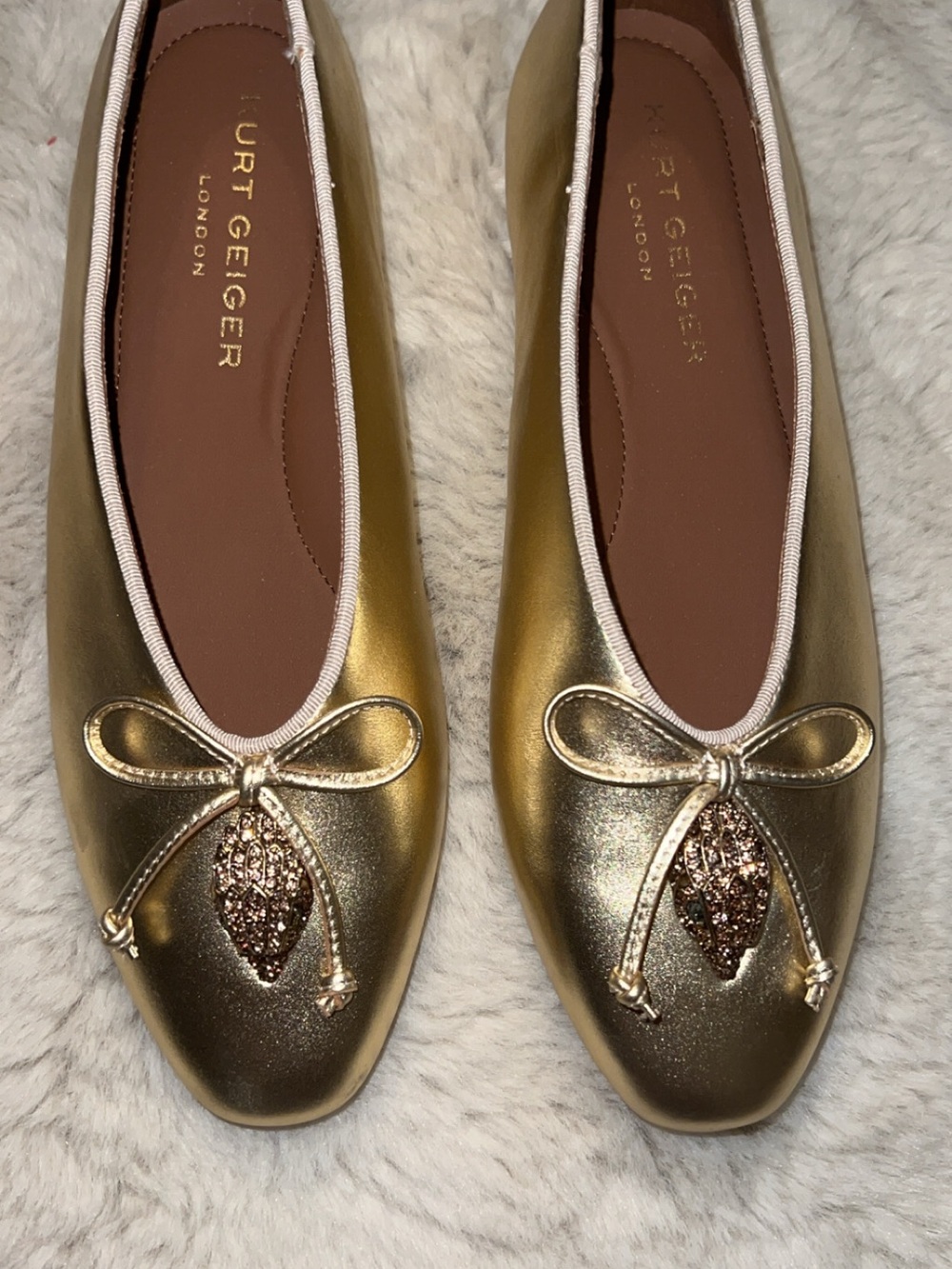 Kurt Geiger Metallic Gold Ballet Flats with Bow & Leaf Accent
